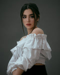 Laura M.